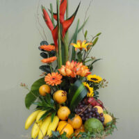 Hermosa Canasta Frutal de Gerberas, Girasol y Rosas - FR10